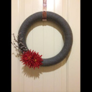 10 inch wreath wrapped in gray yarn