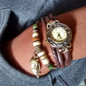 Faux leather boho bracelet style watch with leaf and dolphin charm- Roxanne