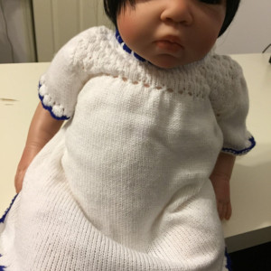 Sweet little white cotton dress for baby