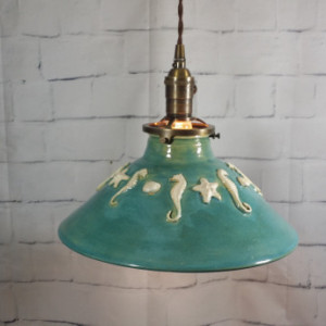Handcrafted Pottery Hanging Ceiling Pendant Light Chandelier. This one is great for your beach restaurant or bar