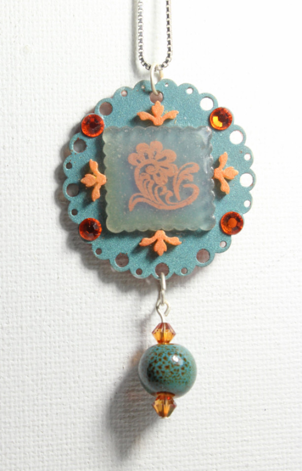 Round Indie teal and orange crystal pendant, plastic flower necklace, aquamarine flower pendant
