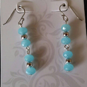 Aqua blue glass beads with small clear beads, 10 inches long, with matching stainless steel hypoallergenic earrings.