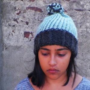 A Charcoal and Mint/Turquoise Knit Beanie with Pompom