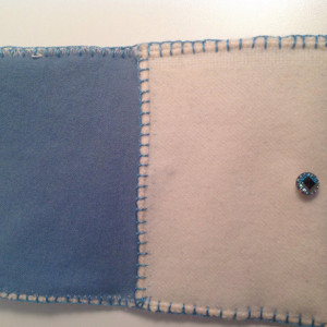 Ivory felted wool wallet with blue silk embroidery