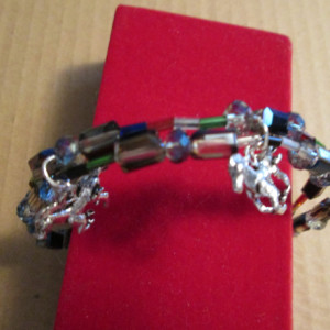 Hand made double strand beaded bracelet with 2-3D sterling silver horse charms