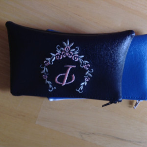 Wallet embroidered with wreath and initial